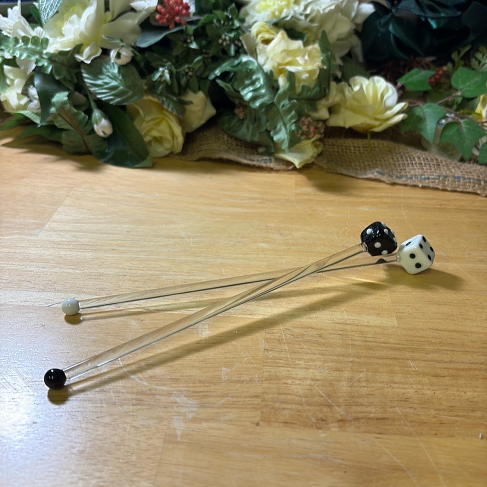 Glass swizzle sticks.